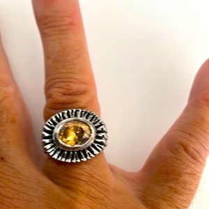 Silver ring with topaz